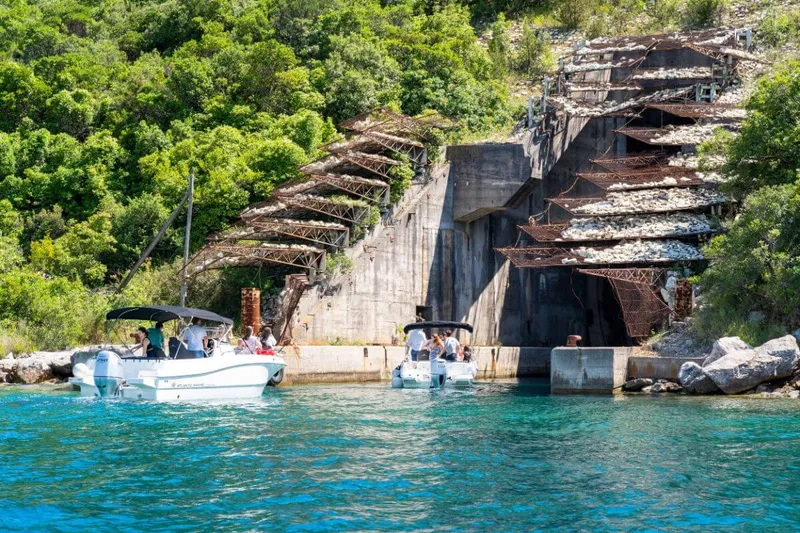 Private tour group swimming in the crystal-clear Blue Cave waters Private tour group swimming in the crystal-clear Blue Cave waters