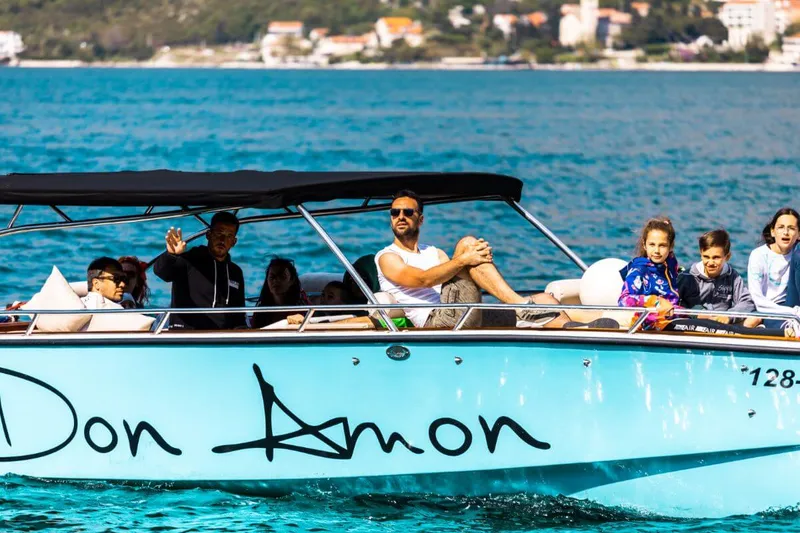 Lounge-style seating and sundeck on the Don Amon luxury tender Lounge-style seating and sundeck on the Don Amon luxury tender