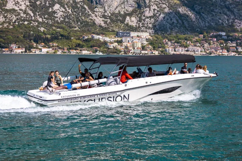 Large group aboard the 20-passenger boat cruising the Bay of Kotor Large group aboard the 20-passenger boat cruising the Bay of Kotor