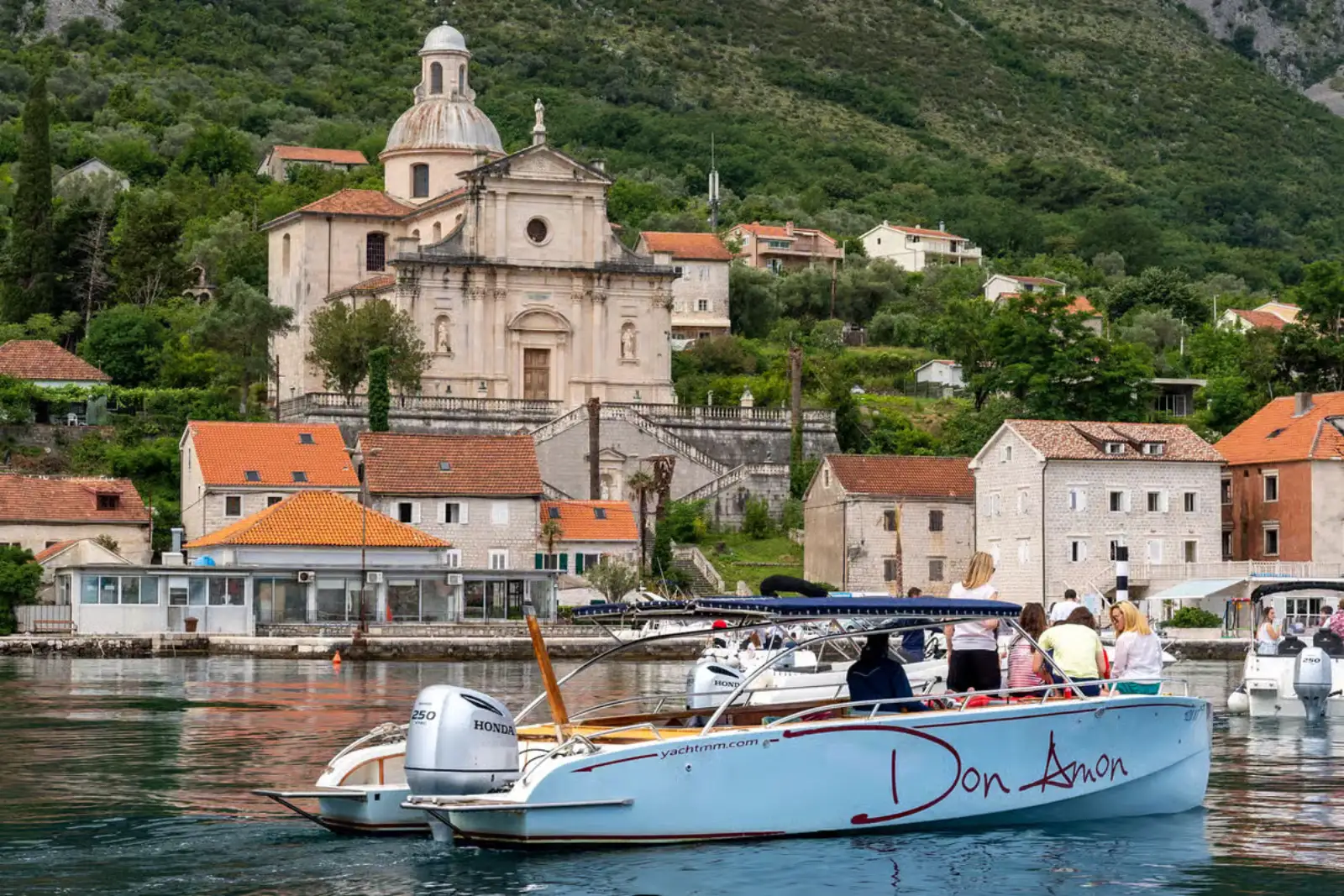 Kotor Bay Highlights - 1h Private speedboat departing Kotor with fortress walls towering above