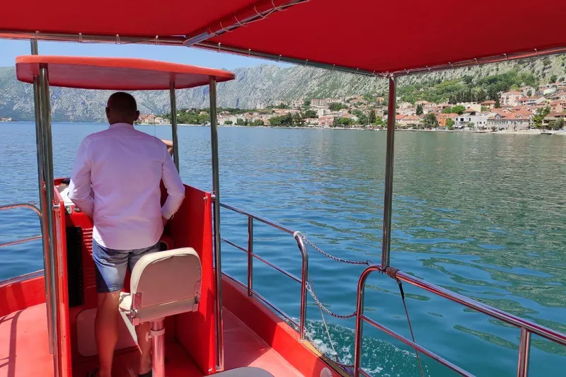 Semi-submarine cruising past the Old Town of Kotor, Montenegro Semi-submarine cruising past the Old Town of Kotor, Montenegro