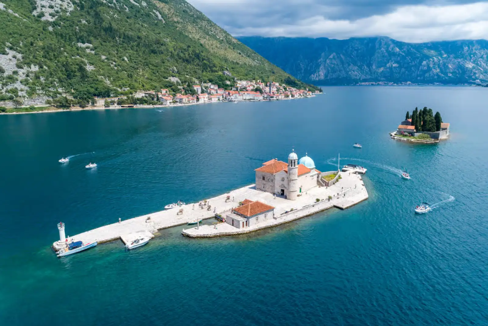 Our Lady of the Rocks and Perast - 1.5h Guests disembarking at Our Lady of the Rocks from a private boat
