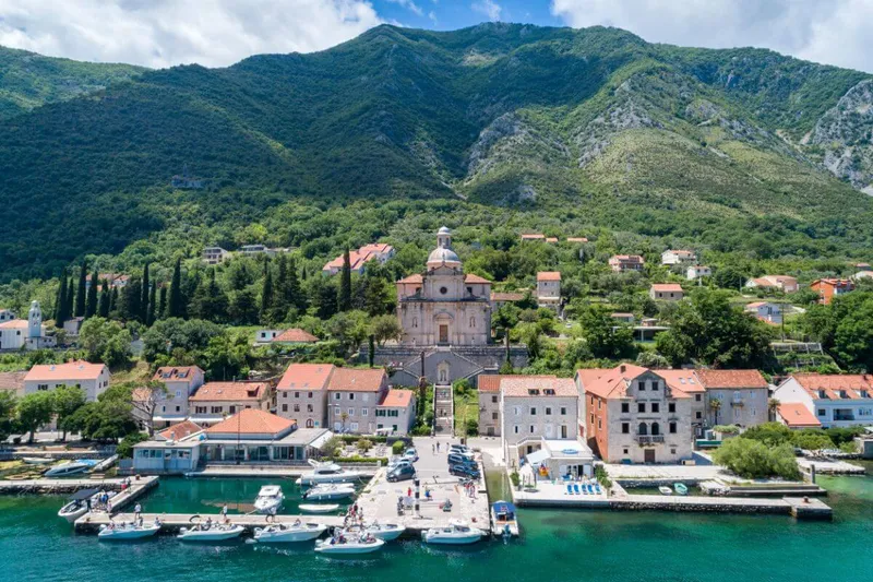 St. George island with its cypress trees seen from near Perast St. George island with its cypress trees seen from near Perast